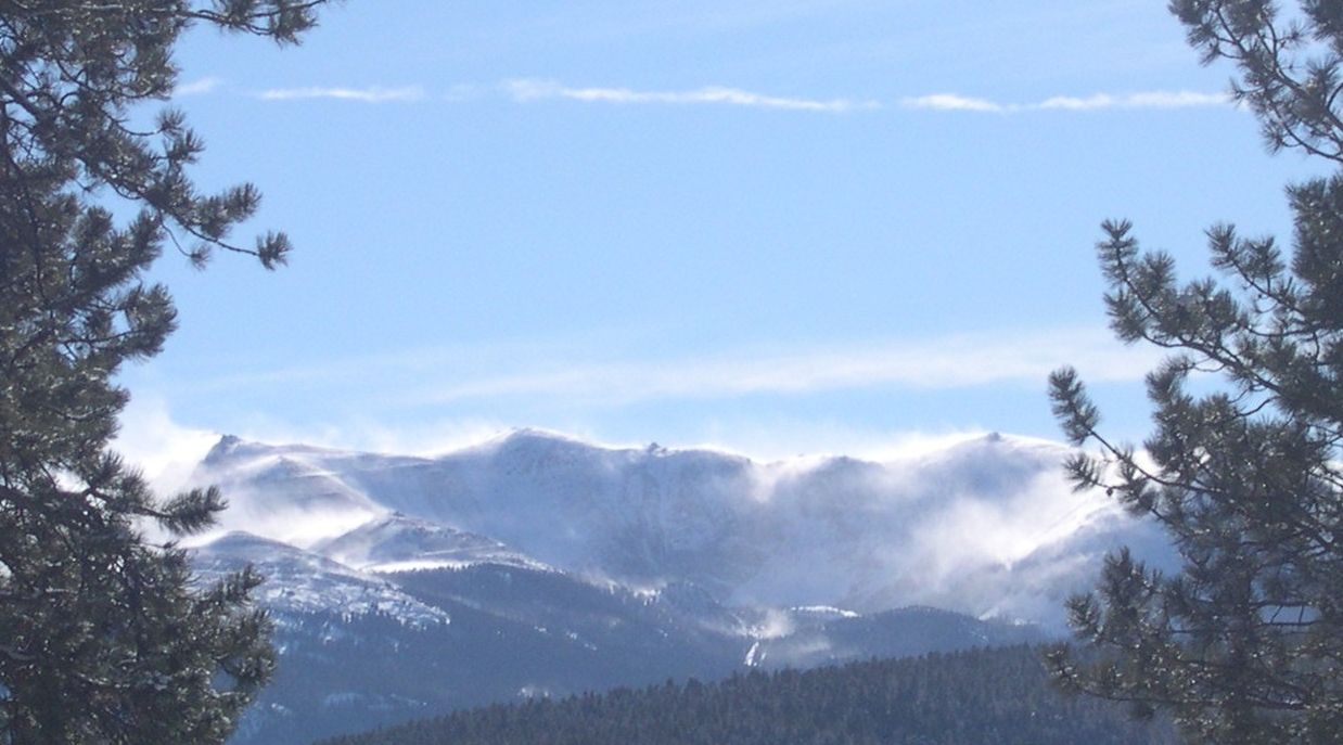 Pikes Peak covered in snow with blowing winds 2007